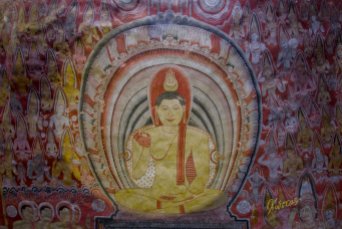 Another painting on the ceiling, which shows the Buddha in blessing pose.