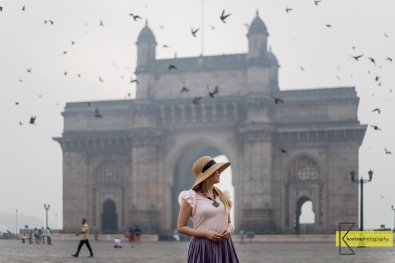 Mumbai gave us some foggy mornings when I wanted sunrise views. Since I cannot control the weather (yet) I used the natural soft light for my portrait and waited for the guest stars: the birds. Gateway of India, Mumbai.