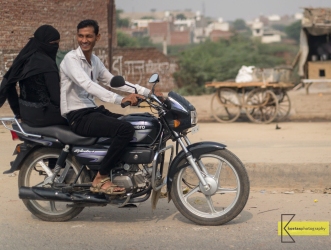 Motorcyclist and wife. Agra, India.