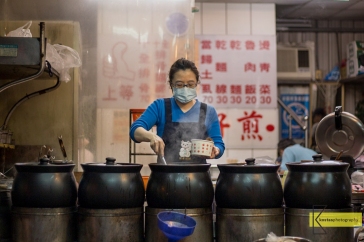 No posing and no preplanning, this is a Real-life portrait of a lady cooking at a Soup Station. Street food is a must try in Taiwan. It's tasty and there is a huge variety to choose from. Shilin Night Market, Taipei, Taiwan.
